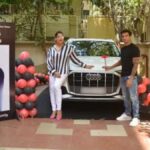 Bollywood star couple Bipasha Basu and Karan Singh Grover recently added a luxurious Audi Q7 worth over 90 lakh to their family. They affectionately call it their toddler daughter Devi's "new ride." The couple shared their excitement on social media, unveiling the plush white car and celebrating with a cake cutting ceremony. This thoughtful gift showcases their love for their daughter and their taste for luxury. Find out more about this special purchase and the couple's journey together since their marriage in 2016.