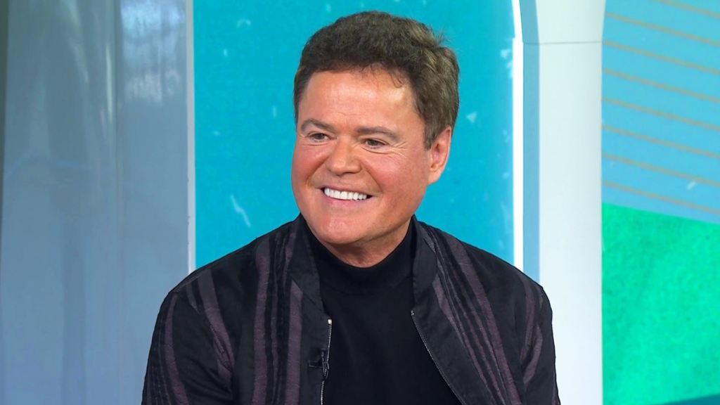 Donny Osmond, renowned for his success as a child star with the Osmonds in the 1970s, shares his openness to reuniting with his sister Marie. Although no specific plans have been made, the siblings, known for their long-running Las Vegas act, are considering the possibility of a one-off special. Donny emphasizes the importance of their sibling dynamic and the organic chemistry they shared, which resonated with audiences. Despite his impressive six-decade career, Donny feels that his current achievements surpass the popularity he enjoyed during his teen idol years.