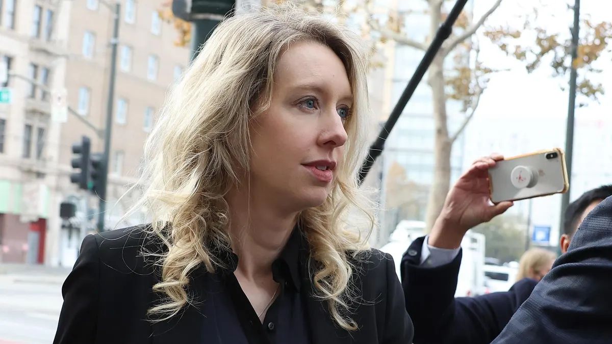 Elizabeth Holmes continues to captivate the public's attention with her intriguing story. From her distinct voice to the massive deception involving billions of dollars and a groundbreaking technology, discover why people are still fascinated by the disgraced founder, who recently began her 11-year prison sentence.