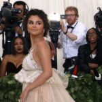 Selena Gomez captivated fans at a Rare Beauty event in Paris with her adorable skater skirt outfit. However, strong winds threatened to cause a wardrobe malfunction reminiscent of Marilyn Monroe's famous incident. Watch the video to witness Selena's graceful response, showcasing her queen-like behavior and handling the situation with elegance.