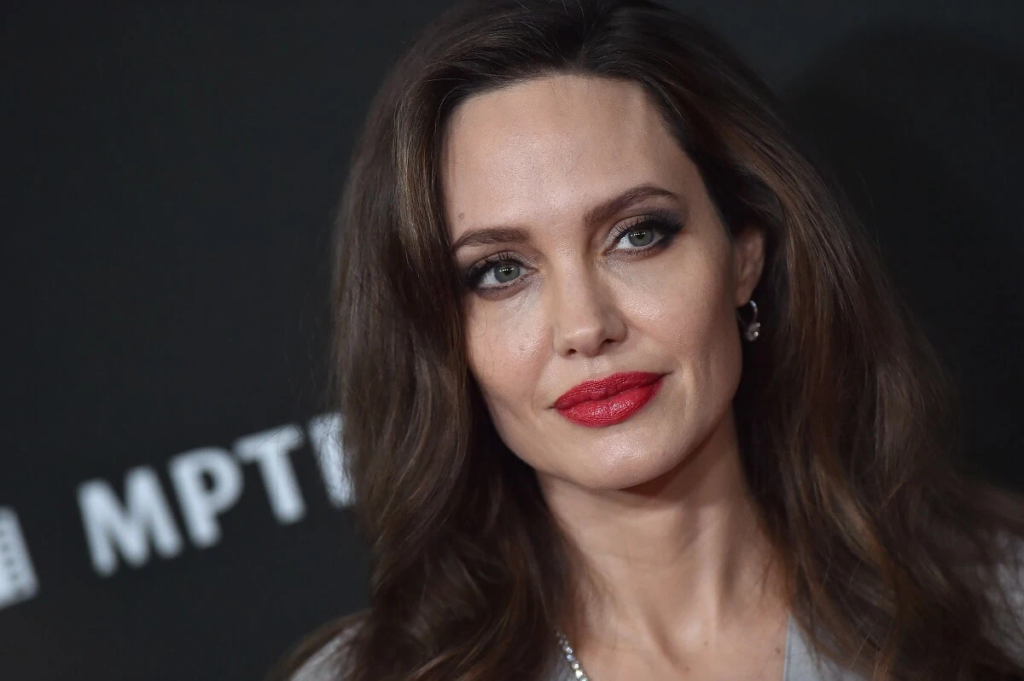 Angelina Jolie, renowned for doing her own stunts, recently shared a terrifying incident on set where a bullet grazed her right ear during the filming of an action sequence. Read on to learn more about this near-death experience that unfolded as the guns were shooting at each other.