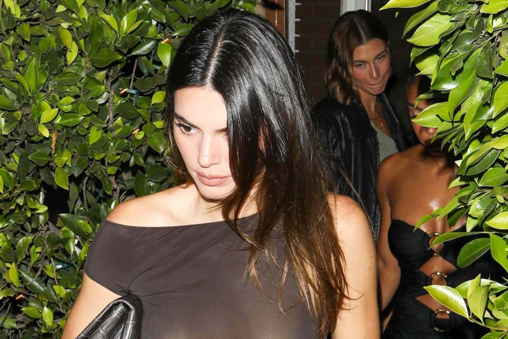 Kendall Jenner boldly grabs attention as she steps out in a daring see-through top for a night out in Santa Monica with her friends. Ditching her bra and flaunting her assets, Kendall's chic and confident style sets social media abuzz. Find out more about her captivating ensemble and the viral pictures that have taken the internet by storm.