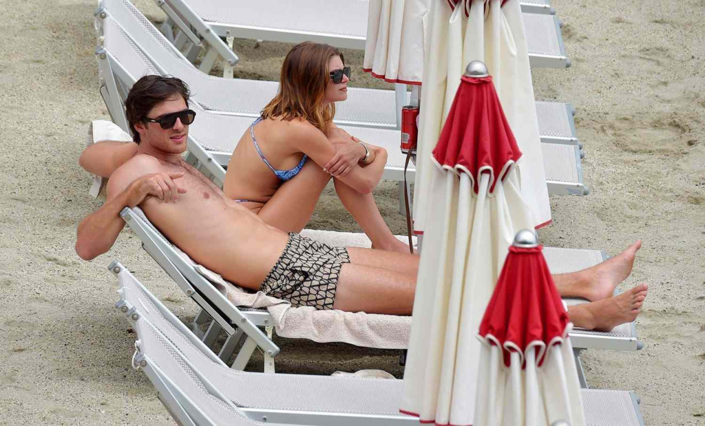 Australian actor Jacob Elordi, popular for his roles in 'The Kissing Booth' and 'Euphoria,' was recently seen soaking up the sun in Paraggi, Italy, alongside his girlfriend Olivia Jade Giannulli. The couple, who have had an on-again, off-again relationship, seemed to be enjoying their quality time together. Read on to know more about their Italian getaway.