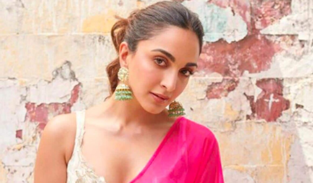 Netizens are convinced that Kiara Advani is expecting her first child with husband Sidharth Malhotra as they 'see a baby bump' in a recent photo from Satyaprem Ki Katha promotions. The rumors have sparked curiosity among fans. Read on to learn more about the speculation surrounding Kiara's pregnancy.