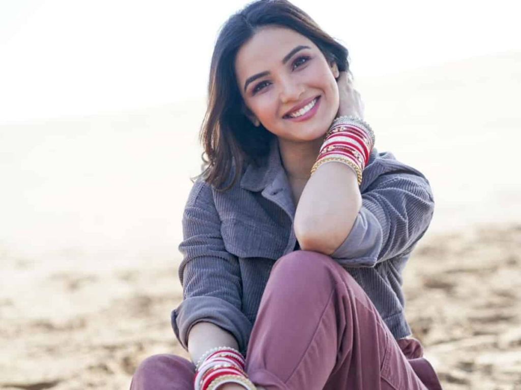 Actress Jasmin Bhasin faced severe criticism from trolls after she was spotted wearing an abaya during her visit to a mosque in Dubai. Netizens bizarrely accused her boyfriend, Aly Goni, of trying to convert her. In response, Jasmin has firmly defended her choice, stating that she followed the dress code out of respect for the sacred place. She emphasized her freedom to decide what to wear and disregarded the negativity from trolls. Jasmin's strong message serves as a reminder that she won't let unnecessary criticism affect her life and relationship.