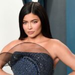 In a shocking revelation, Kylie Jenner confirms undergoing breast enhancement surgery and multiple face surgeries, a stark contrast to her previous denials. Netizens express strong reactions to her confession, accusing her of trying to rewrite her history. Read on to know more about Kylie's revelation and the public's response.