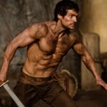 Check out Henry Cavill's raunchy look from The Immortals as we delve into his masculine and ripped physique. The hot actor's rugged appearance in the movie leaves us drooling!