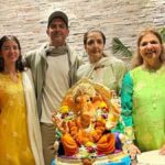 "Hrithik Roshan and Saba Azad join the Roshan family for a joyous Ganpati Visarjan. See the heartwarming moments and pictures of this Bollywood couple's celebration."