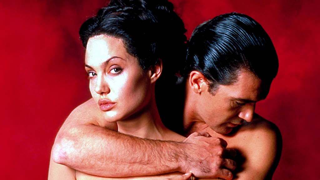 Spanish actor Antonio Banderas shares his struggles during intimate scenes with Angelina Jolie in "Original Sin" and why he couldn't touch her.