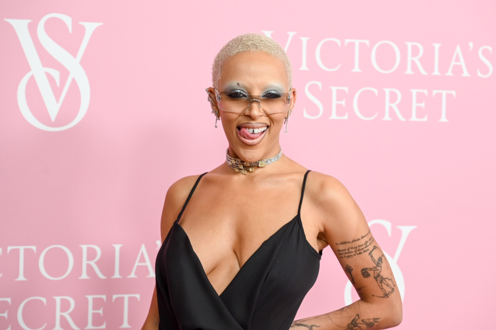 "Doja Cat, known for her candidness, took to Instagram to share her humorous yet honest rant about wearing an uncomfortable Victoria's Secret outfit, comparing it to a block of cheddar cheese. Here's what she had to say."