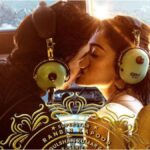 "Anil Kapoor unveils a new 'Animal' poster, showcasing Ranbir Kapoor and Rashmika Mandanna sharing a passionate kiss, along with the release date of the song 'Hua Main'."