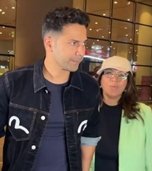 "Varun Dhawan's latest airport appearance sparks excitement as he flaunts his new look for the upcoming VD 18 project, leaving fans curious about his role."