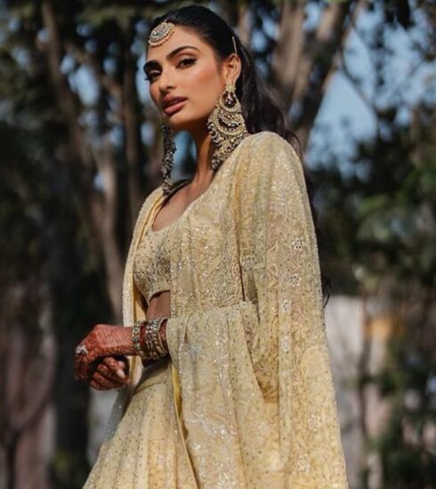 Athiya Shetty's chic fashion move using her dad's belt warms hearts in a delightful Instagram exchange. Find out more.