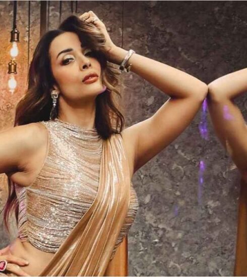 "Dive into the details of Malaika Arora's mesmerizing look in Sonaakshi Raaj's liquid gold saree, a blend of tradition and trend, perfect for festive occasions."