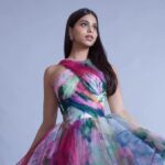 "Explore Suhana Khan's mesmerizing style as she dazzles in a floral mini dress by Gauri and Nainika. A modern fairy-tale aesthetic comes to life in her fashion choice."