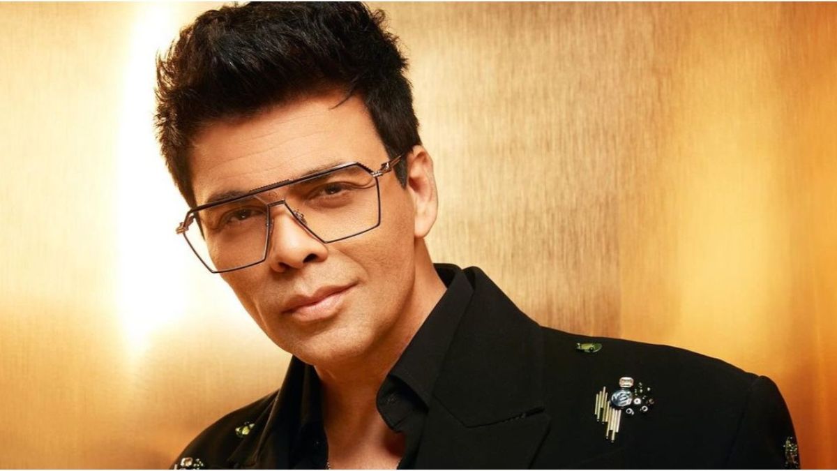 Karan Johar hits back at a troll's offensive remark, emphasizing individuality and defending family values in the face of online criticism.
