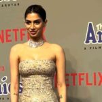 "Khushi Kapoor turns heads in a dazzling gold gown, a poignant nod to her late mother's legacy. Dive into the glamour of The Archies screening ensemble."