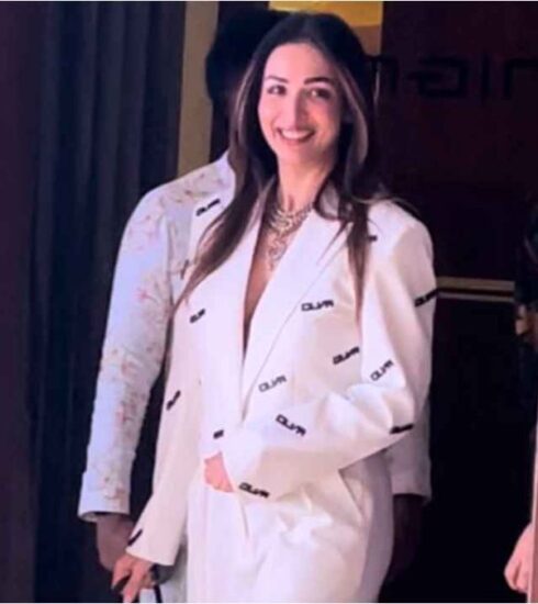 "Malaika Arora steals the spotlight in a classy ivory pantsuit, blending timeless charm with Gen-Z style – a captivating narrative in high-end fashion."