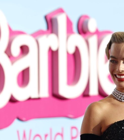 "Discover the intriguing behind-the-scenes drama as Margot Robbie shares details of a call from Oppenheimer producer Charles Roven, leading to a clash in the release dates of 'Barbie' and 'Oppenheimer.' Robbie's refusal to yield resulted in unexpected success, creating the Barbenheimer phenomenon."