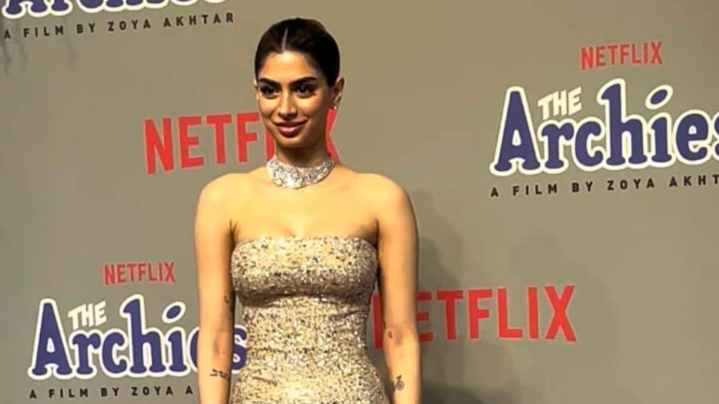 "Khushi Kapoor turns heads in a dazzling gold gown, a poignant nod to her late mother's legacy. Dive into the glamour of The Archies screening ensemble."
