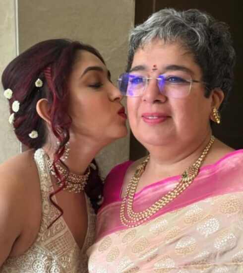 In an intimate capture, Ira Khan shares a kiss with her mother, Reena Dutta, during an unseen mehendi ceremony. Explore the warmth of their bond in this touching moment between mother and daughter.