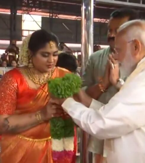 "Prime Minister Narendra Modi graces the joyous occasion of Suresh Gopi's daughter's wedding, adding political charisma to cultural celebrations in Guruvayur."