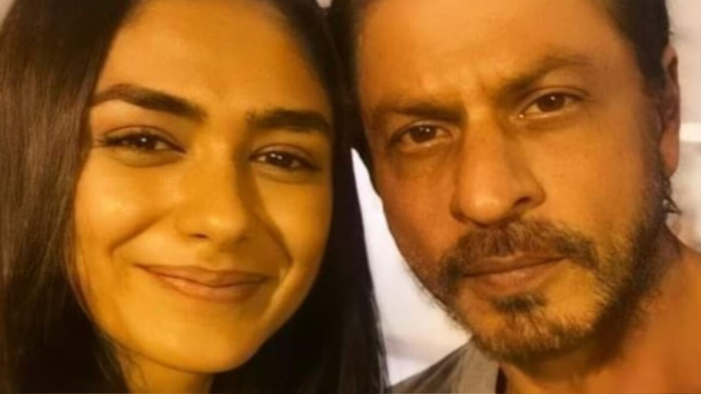 "In an exclusive interview, Mrunal Thakur shares insights on why she associates the 'Queen of Romance' title with Bollywood icon Shah Rukh Khan, adding a unique twist to her cinematic journey."
