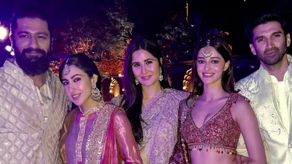 "Witness the magic as Katrina Kaif and Vicky Kaushal strike a pose alongside Ananya Panday, Aditya Roy Kapur, Sara Ali Khan, and Arjun Kapoor. Explore the star-studded affair that unfolded in dazzling event photos capturing Bollywood's elite in their glamorous best."
