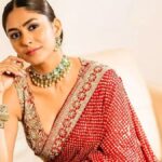 Mrunal Thakur is channeling desi diva vibes in two exquisite sharara sets, perfect for the wedding season. These stunning outfits are a must-see for brides and guests alike.