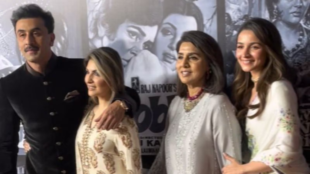 Neetu Kapoor shares a heartfelt moment remembering her late husband, Rishi Kapoor, during Raj Kapoor's birth anniversary celebration, with a touching photo featuring Alia Bhatt and Riddhima Kapoor.
